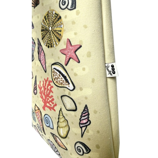 Shells on sand textile tote bag