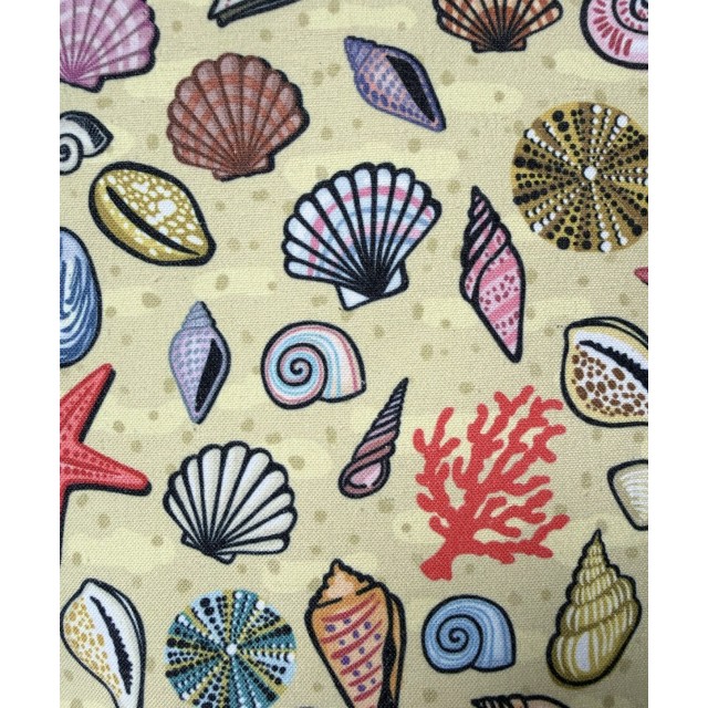 Shells on sand textile tote bag